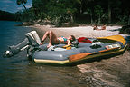 Lolo reclining on raft in Hunting Island lagoon Lolo reclining on raft in Hunting Island lagoon