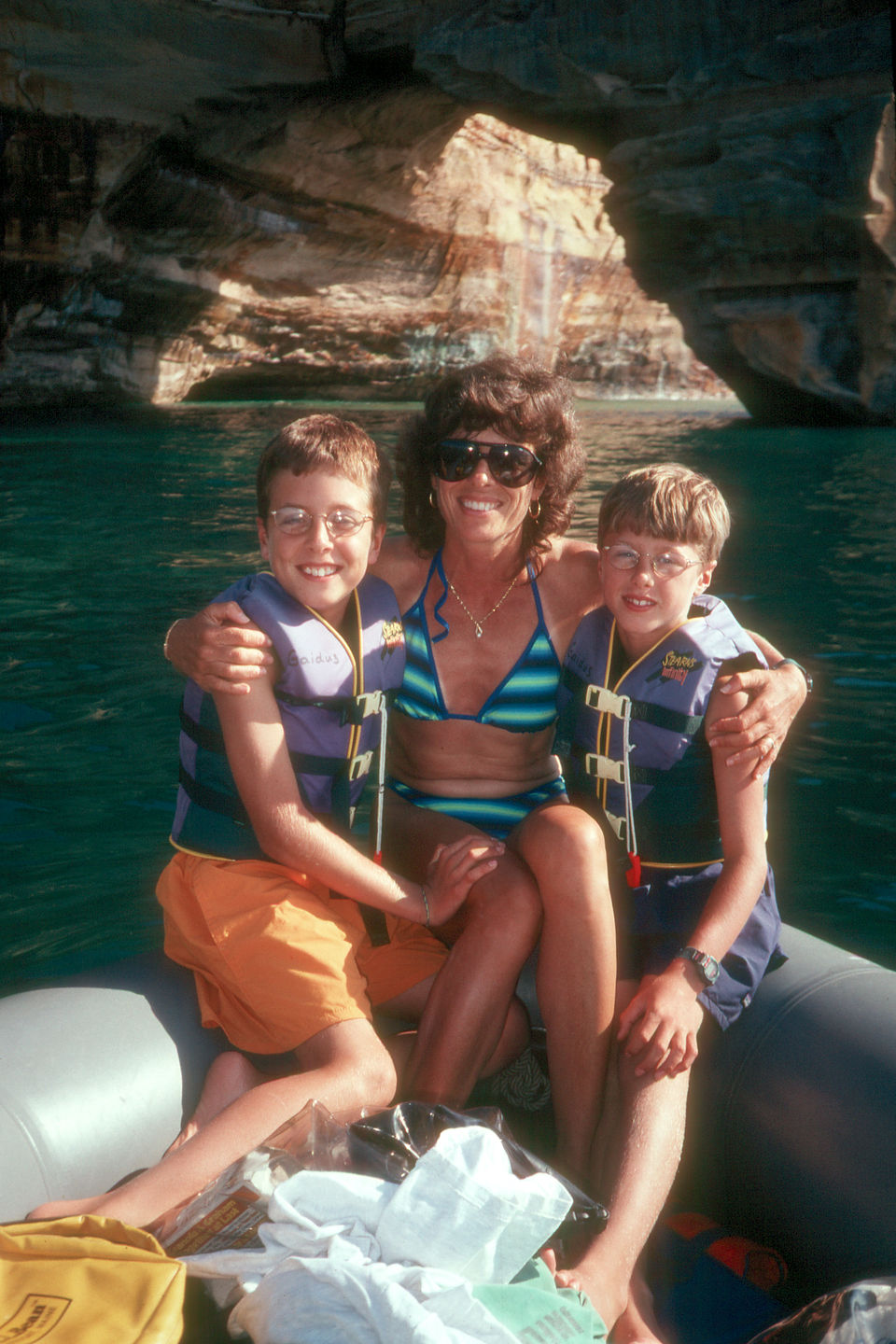 Lolo and boys boating along the pictured rocks Lolo and boys boating along the pictured rocks