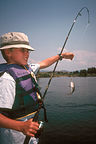 Tom with tiny fish
