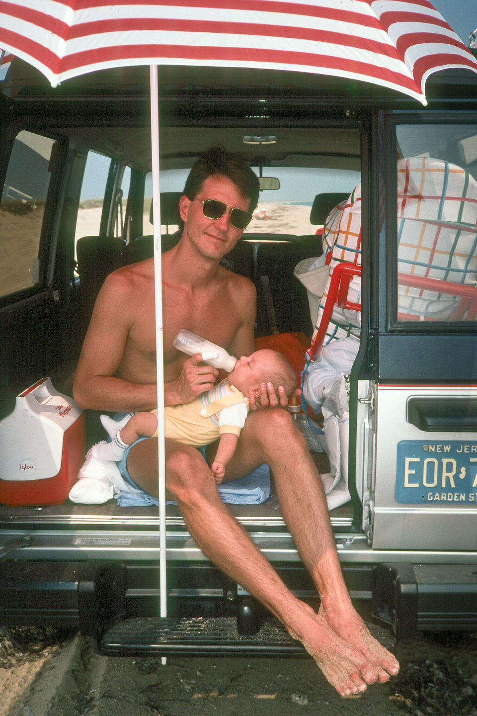 Herb and baby Andrew Tailgating in back of Isuzu Trooper Herb and baby Andrew Tailgating in back of Isuzu Trooper