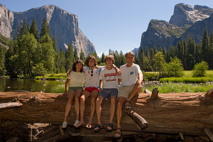 Gaidus family on log with El Capitan