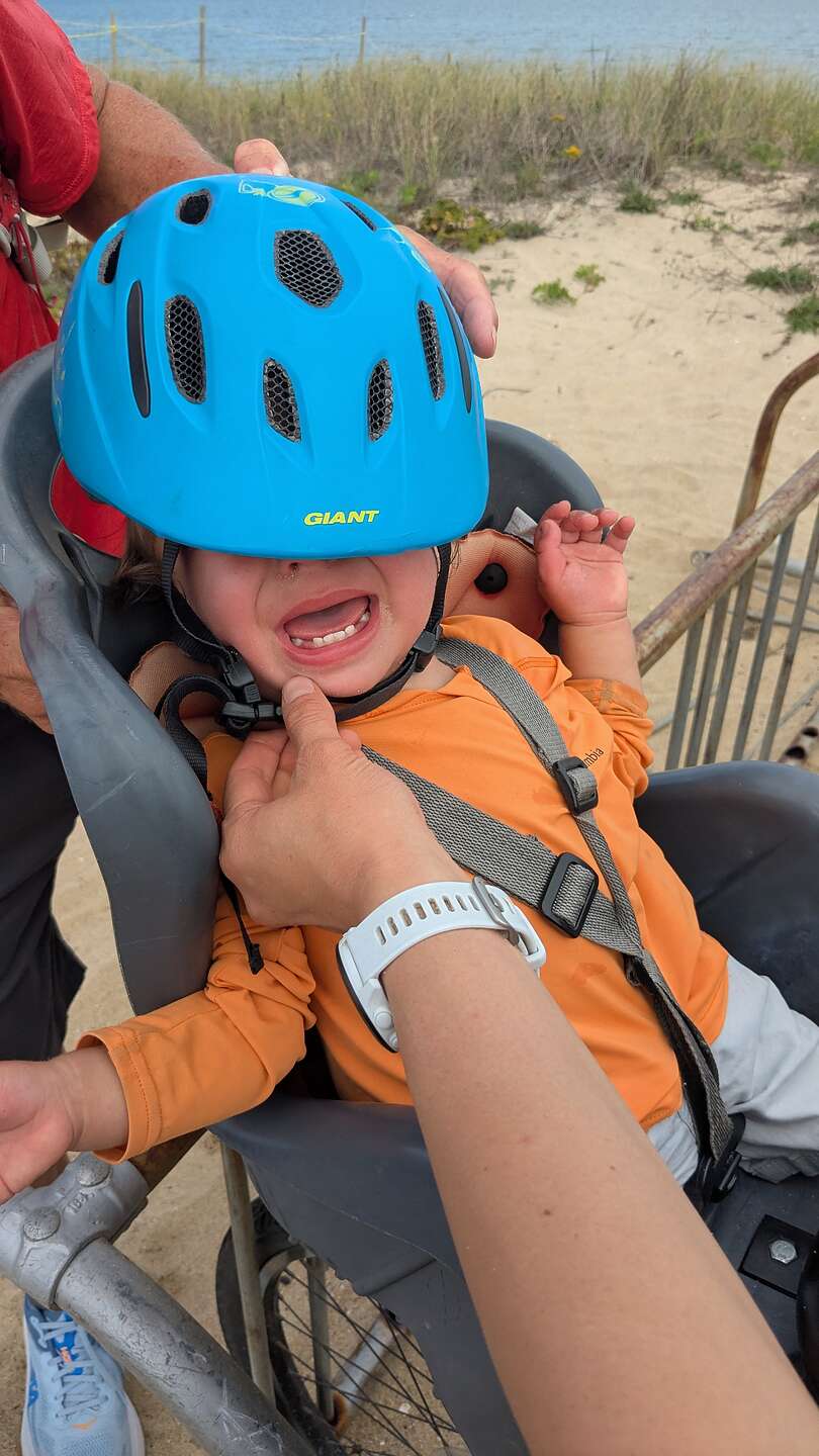 Walker's first time with a bike helmet