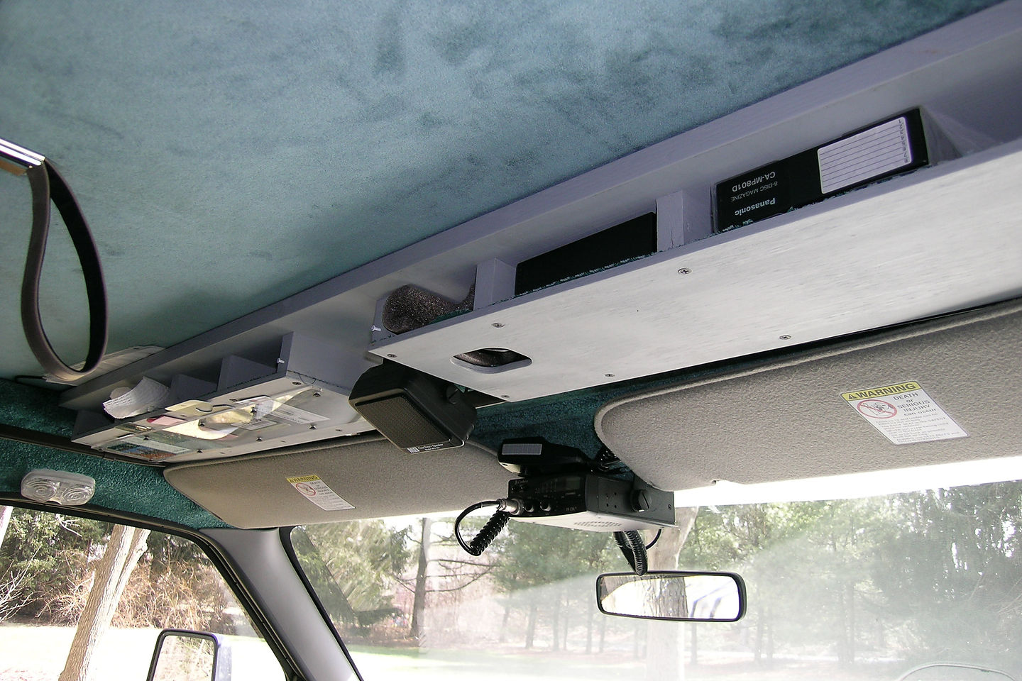 Overhead cab storage console Overhead cab storage console