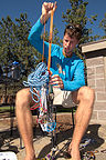 Tom organizing his climbing rack at the Crown Villa RV Resort